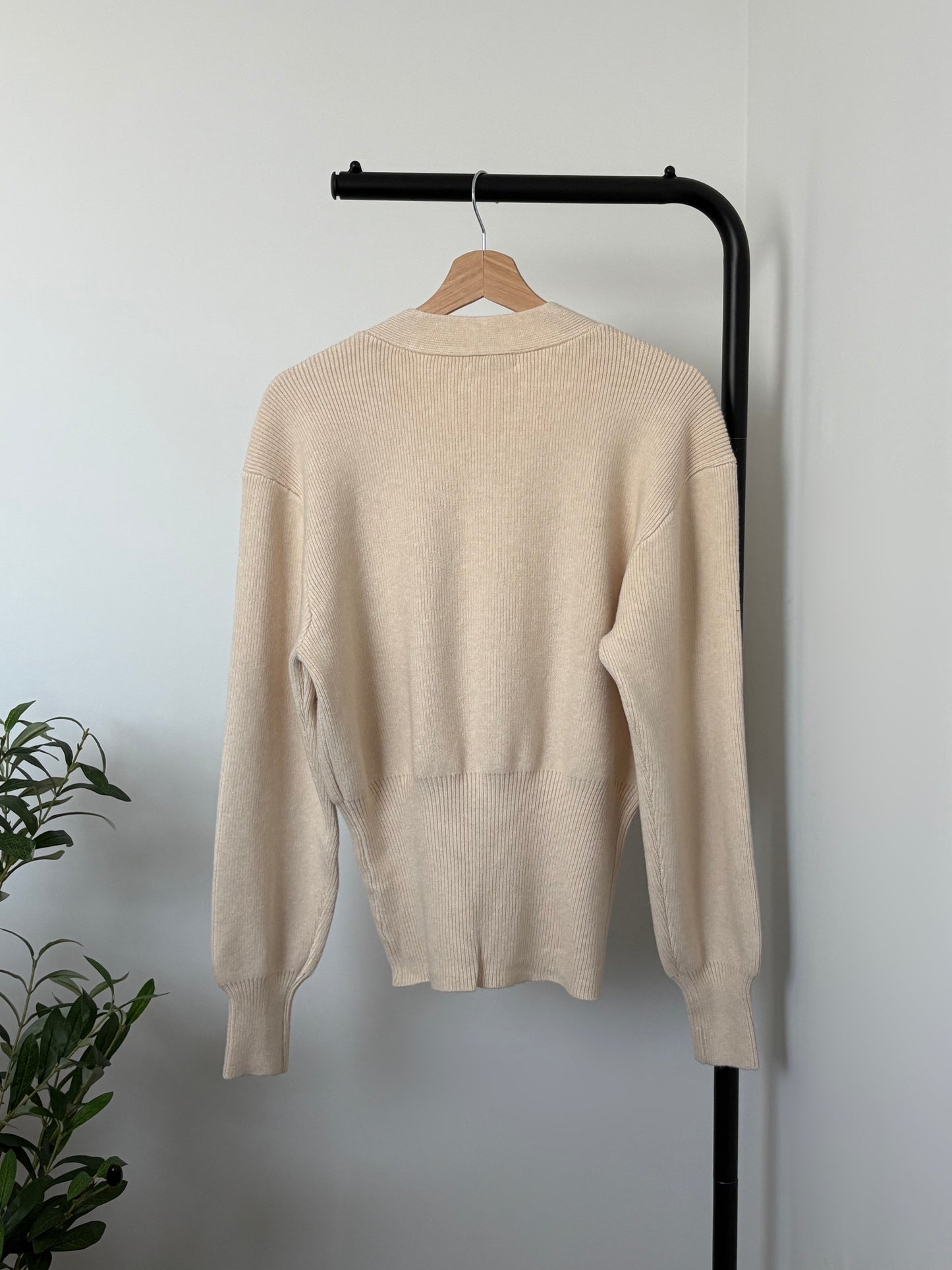 Beige V-neck cardigan with gold button detail