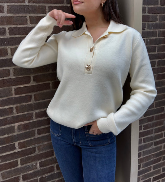 Pull beige col polo boutons dorés