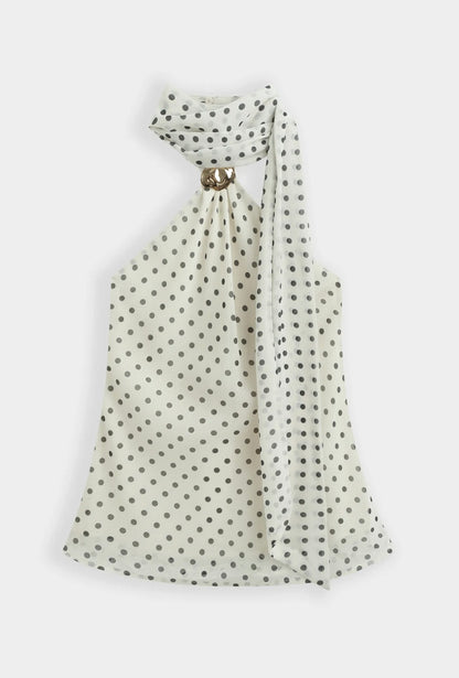 Top ivoire à pois noir col foulard orné d’une broche dorée