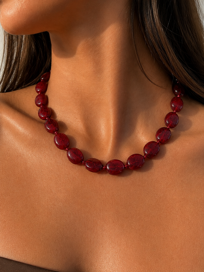 Collier de perles bordeaux