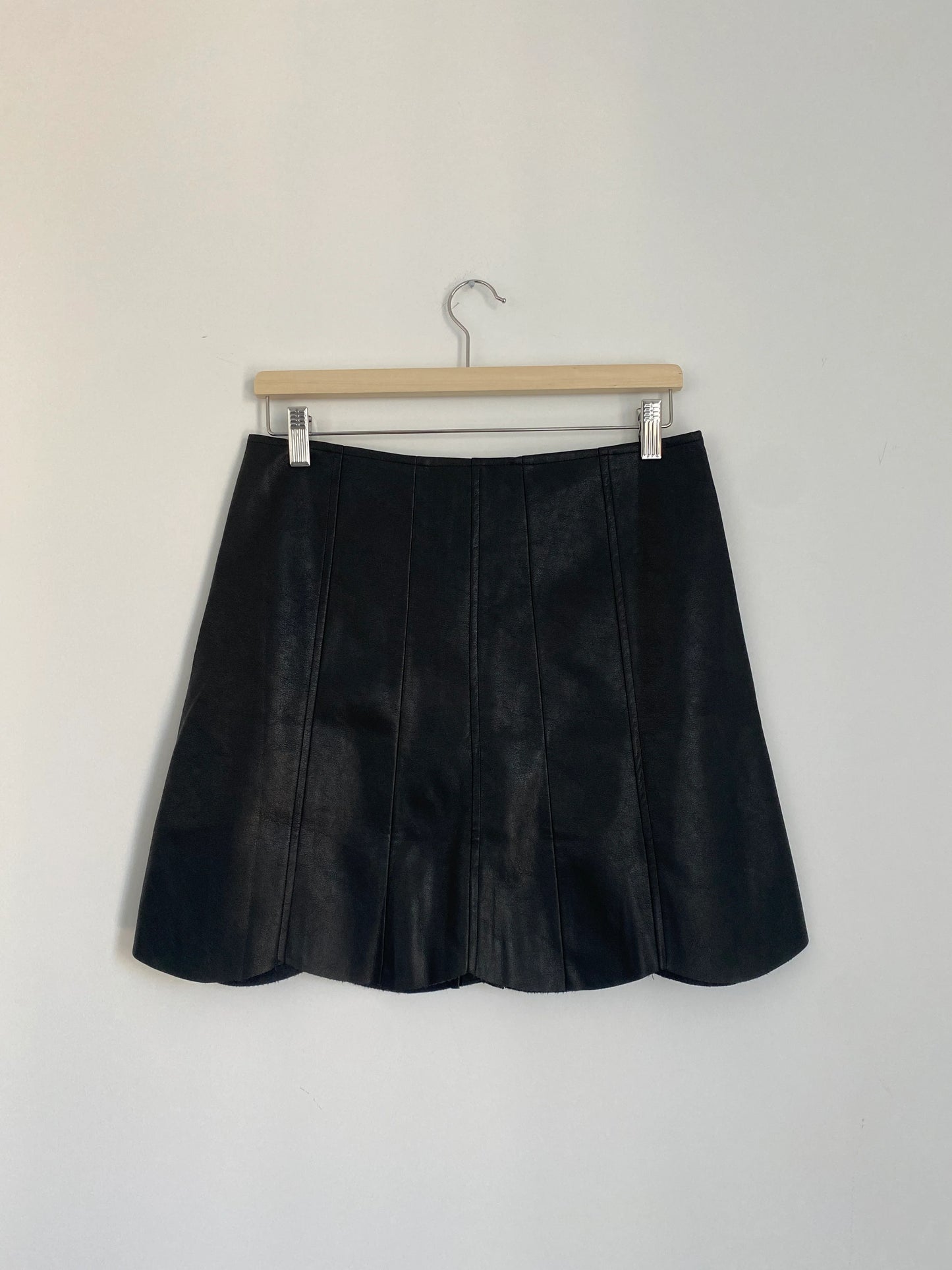 Buttoned black faux leather skirt